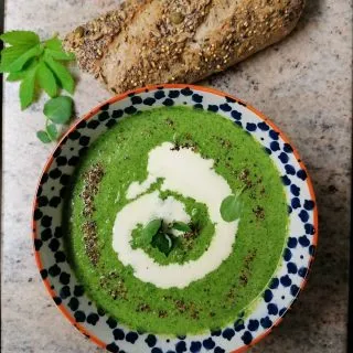 Ground Elder, Watercress and Pea soup (recipe and fun facts). 

Ingredients

500g Watercress
500g Ground Elder
2 handfuls of peas
Sprig of mint
Rock or Sea salt to taste (today I used my wild garlic infused Himalayan rock salt)
Freshly ground black pepper to taste
150ml double cream
400ml boiling water
1 large onion
Large knob of butter

Method

Wash Watercress and Ground Elder.
Chop onion and fry in the butter on a low heat for around five minutes until softened
Add the foraged greens and sauté on a medium heat for another 5 minutes.
Add peas, mint, seasoning and boiling water and continue to simmer for another couple of minutes.
Take off the heat and blitz to your desired consistency.
Add double cream and stir.
Enjoy!!!!

This lovely parsley and peppery tasting soup is one I put together at least once a week, when the Ground Elder and Watercress is about. It is full of green goodness!

Watercress should only be foraged from a clean water source and should always be cooked if picked from areas with livestock, due to possible liver fluke. Cooking it will kill this microscopic parasite and make it perfectly safe to eat.

The Ground Elder should always be foraged before the flowers appear. After it flowers it can become a laxative, diuretic and have a slight sedative effect.

FUN FACT!
Watercress (Nasturtium Officinale). This powerhouse plant is one of the oldest known leaf vegetables consumed by humans. It is a member of the Brassica family (cabbage and mustard). It has many, many health benefits.

Ground Elder (Aegopodium podagraria). This was brought over by the Romans as a pot herb. It escaped and it became a very invasive plant. The bane of many gardeners lives! It has been used to treat Arthritis and Gout amonst lots of other ailments, hence one of its common names GoutWeed.
#Forageuk #foraging #Wildfood #foriginginworcestershire #foragingcourses #Wildfoodwalks #pesticidefree #Plantbased #watercress #rewild #Reconnectwithnature #groundelder #plasticfree #goutweed #aegopodiumpodagraria #nasturtiumofficinale
#eatgreen #eatyourweeds